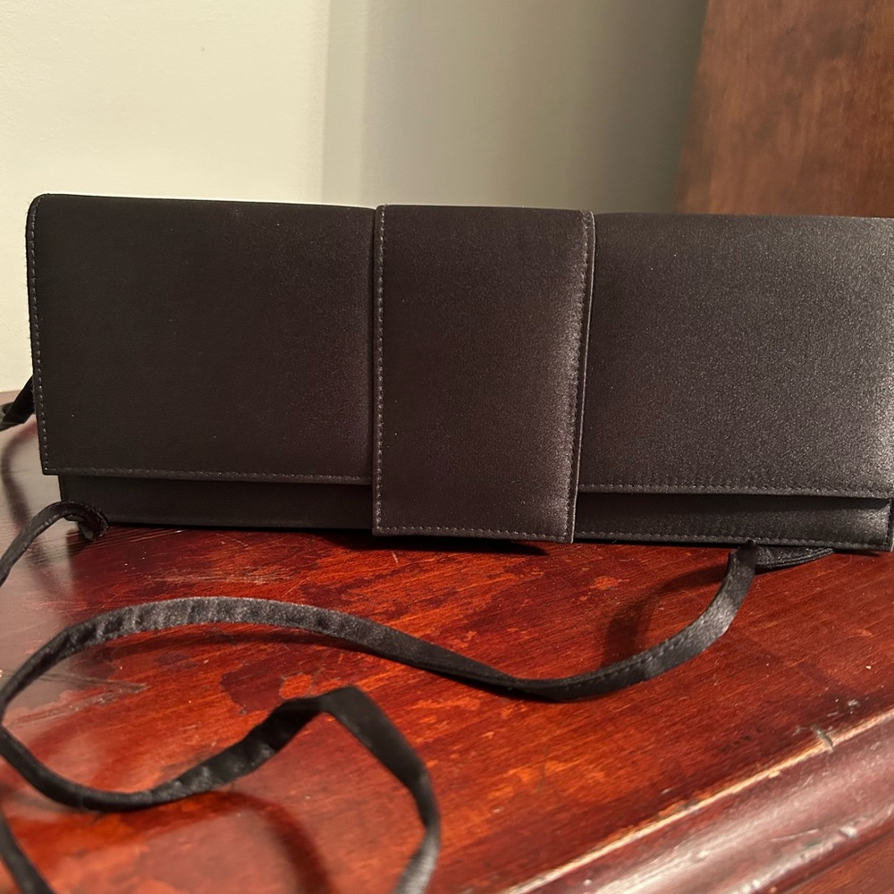Black clutch with shoulder strap